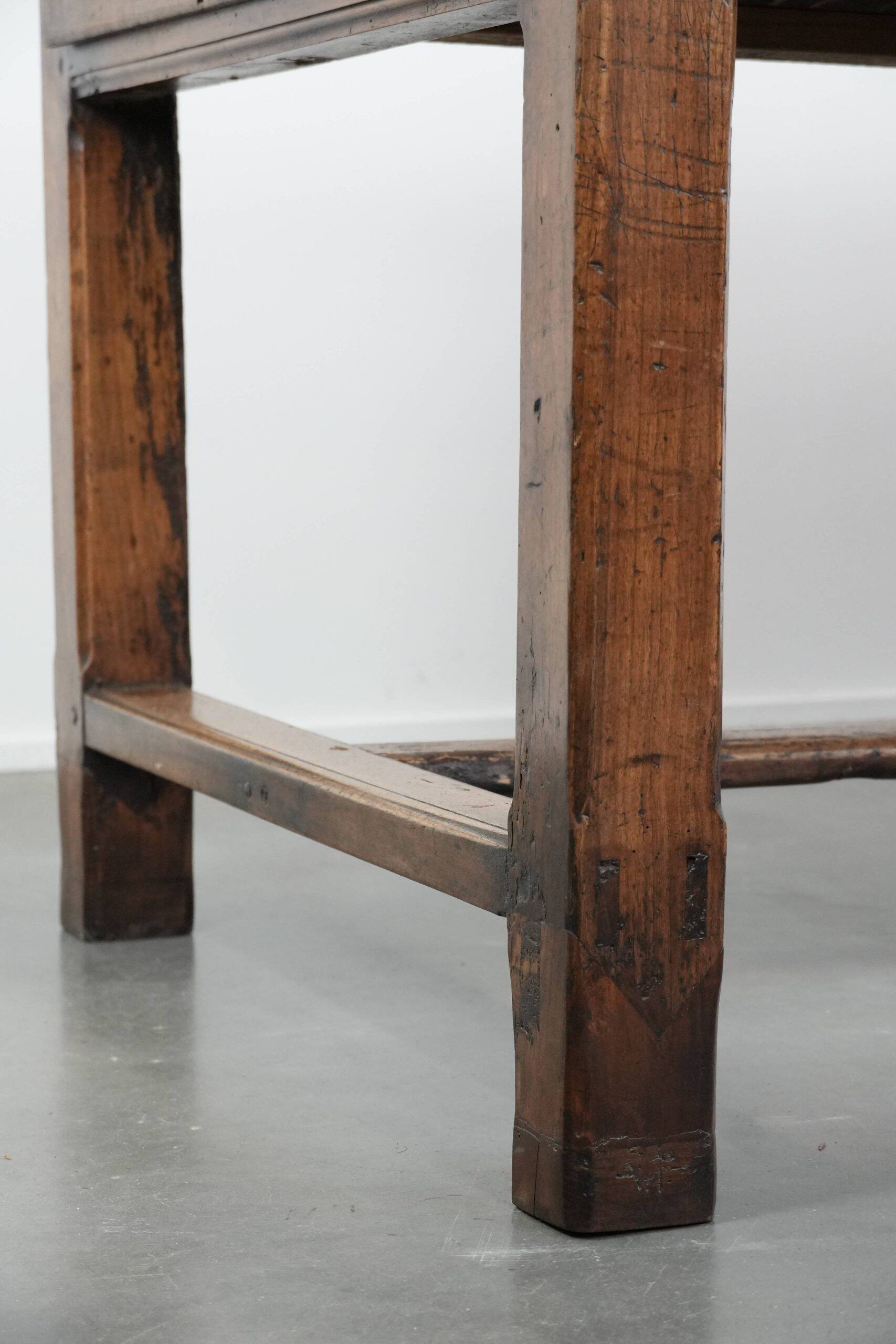 Robust French farmhouse antique dining table from the 18th century