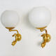 Pair of wall lamps with carp fish, brass and white opaline globe 1960