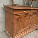Honey-colored wood sideboard