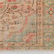 Tapis vintage rouge pâle