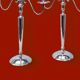 Pair of vintage three-armed chrome metal candlesticks