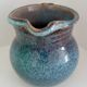 Pitcher in enamelled blue sandstone
