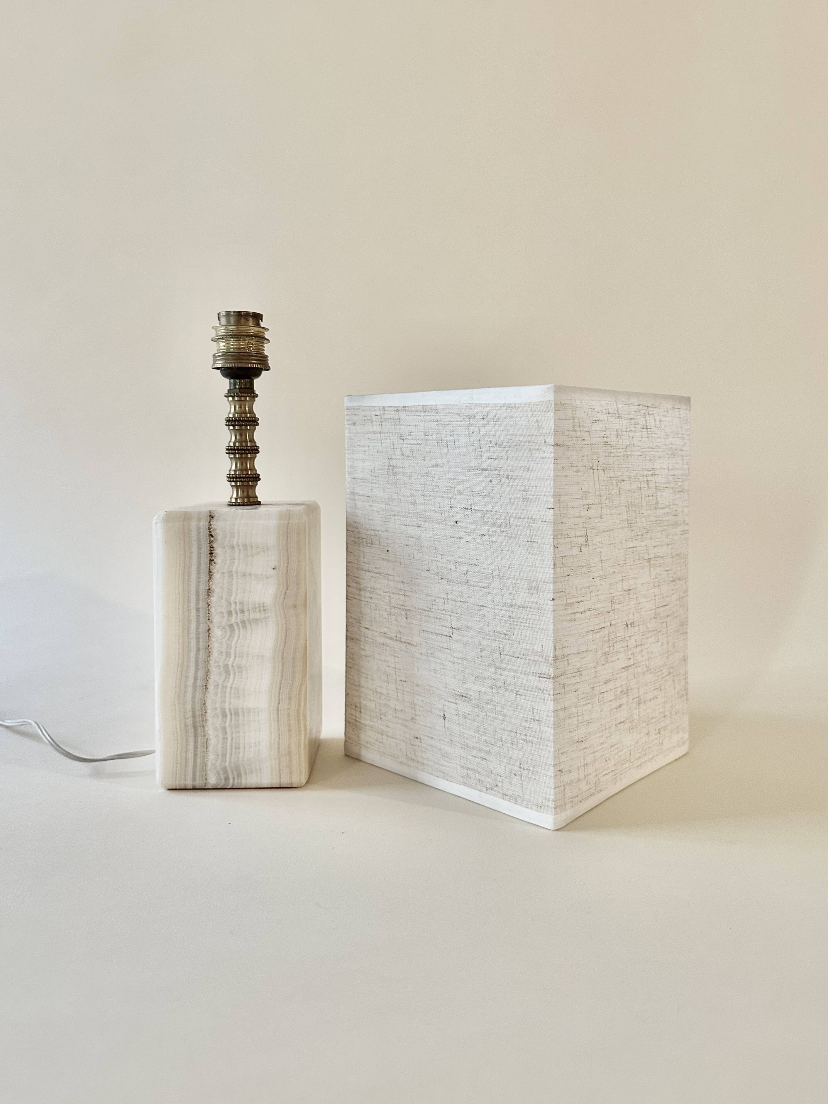 Onyx and brass lamp with a square shade.