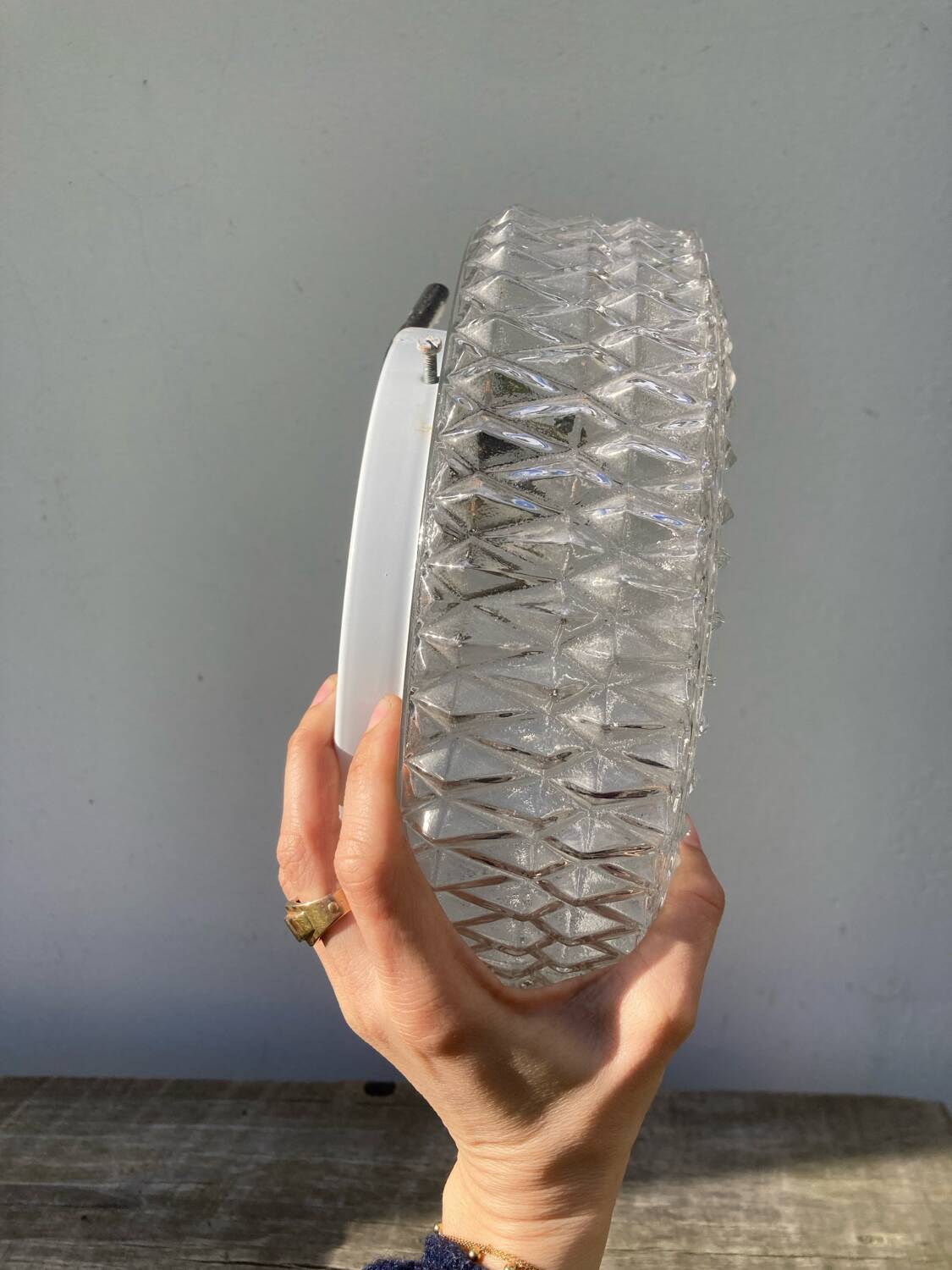 Pair of transparent round glass wall lights