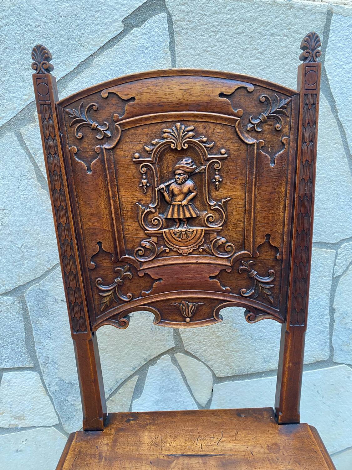 Carved walnut lounge chair