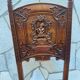 Carved walnut lounge chair