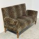 Vintage leopard velvet sofa / wall sofa with drop-down arms, France.