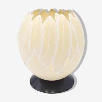 Ostrich egg carved on base