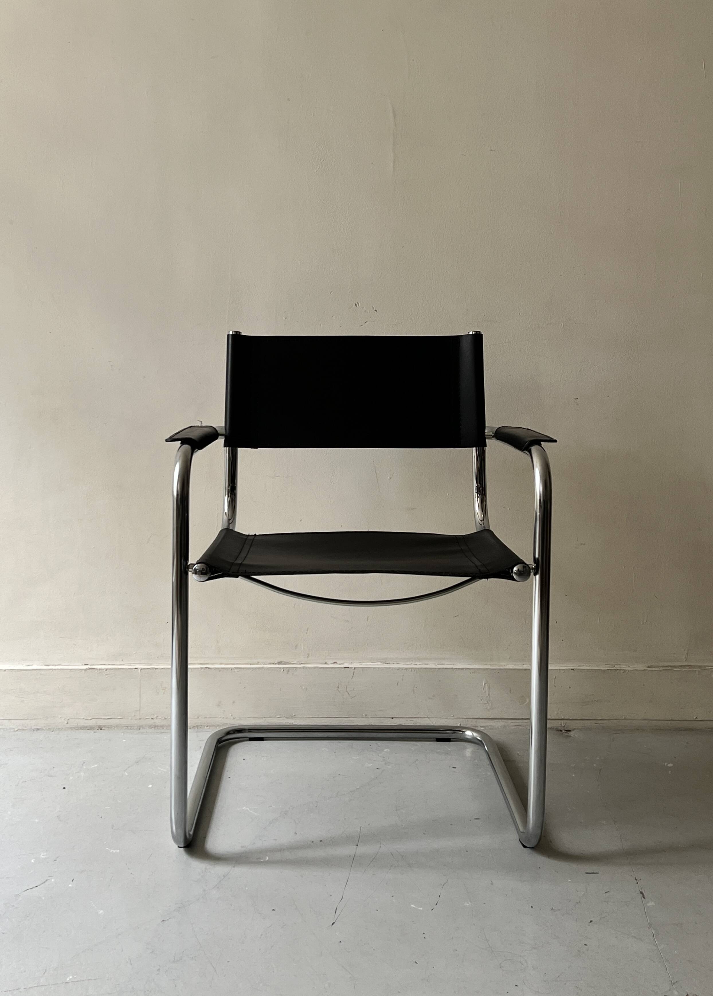 Chrome and black leather armchair