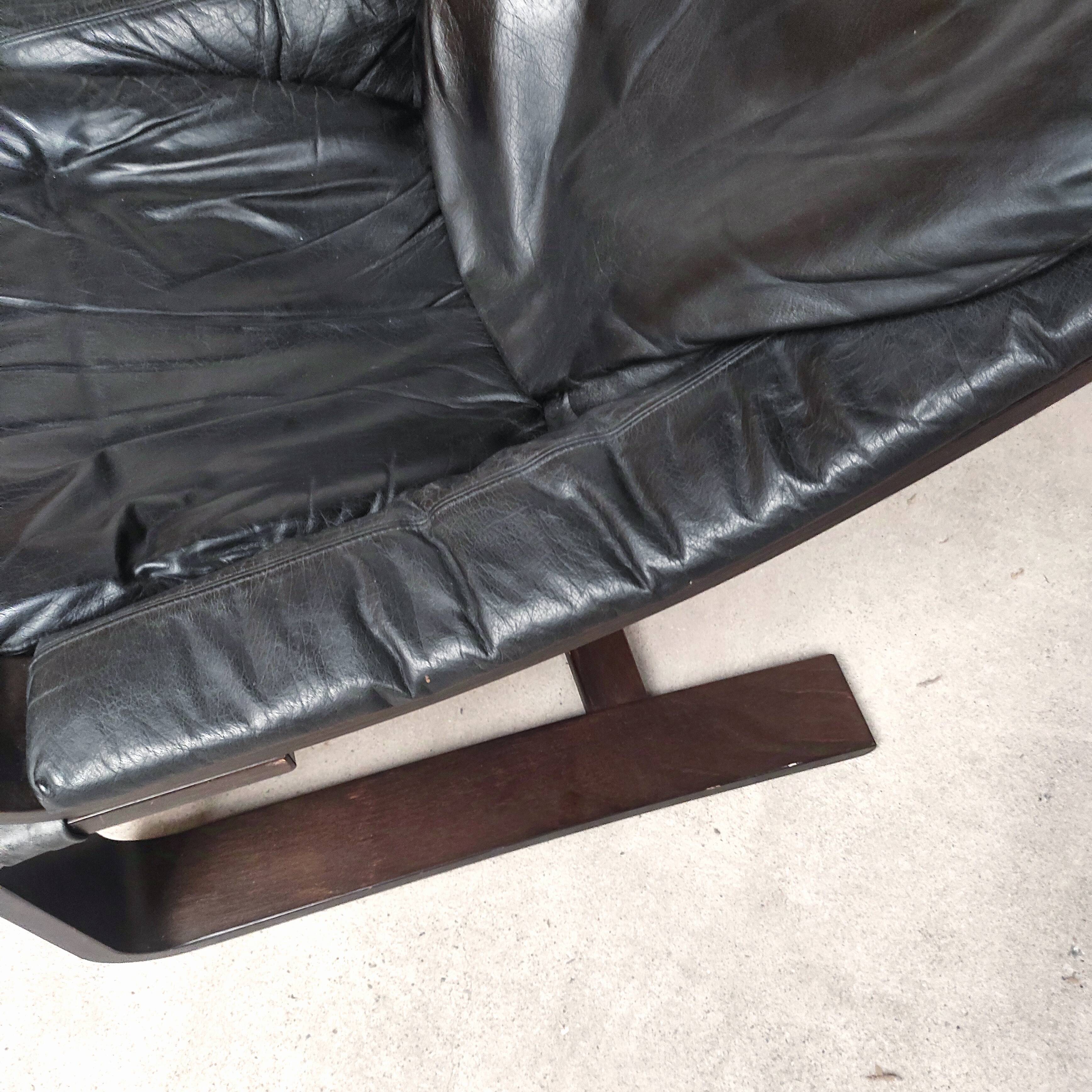 Pair of Kroken armchairs in black leather