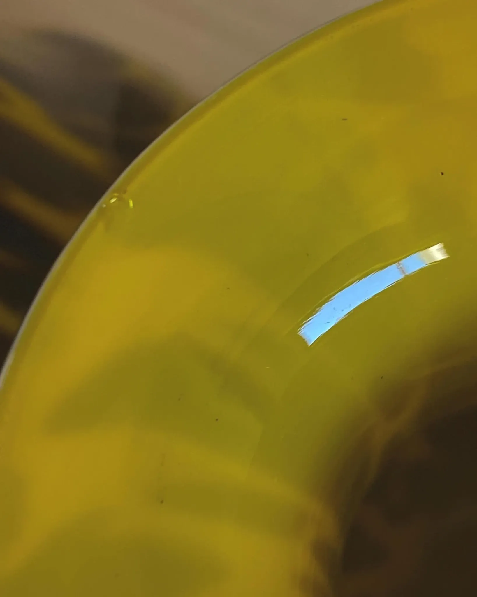 Vintage Murano glass vase from the 1990s, yellow art glass with black spots, postmodern Italian design.