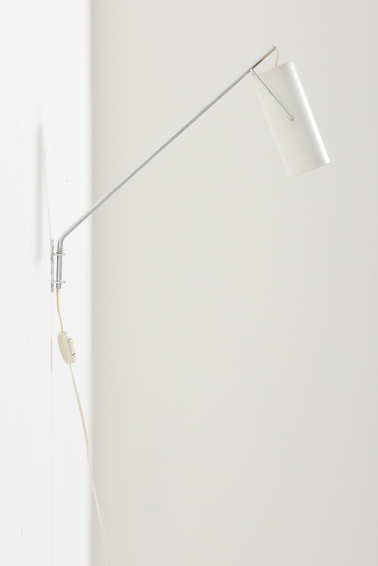 Swinging arm wall lamp by Raak, Netherlands - 1960's