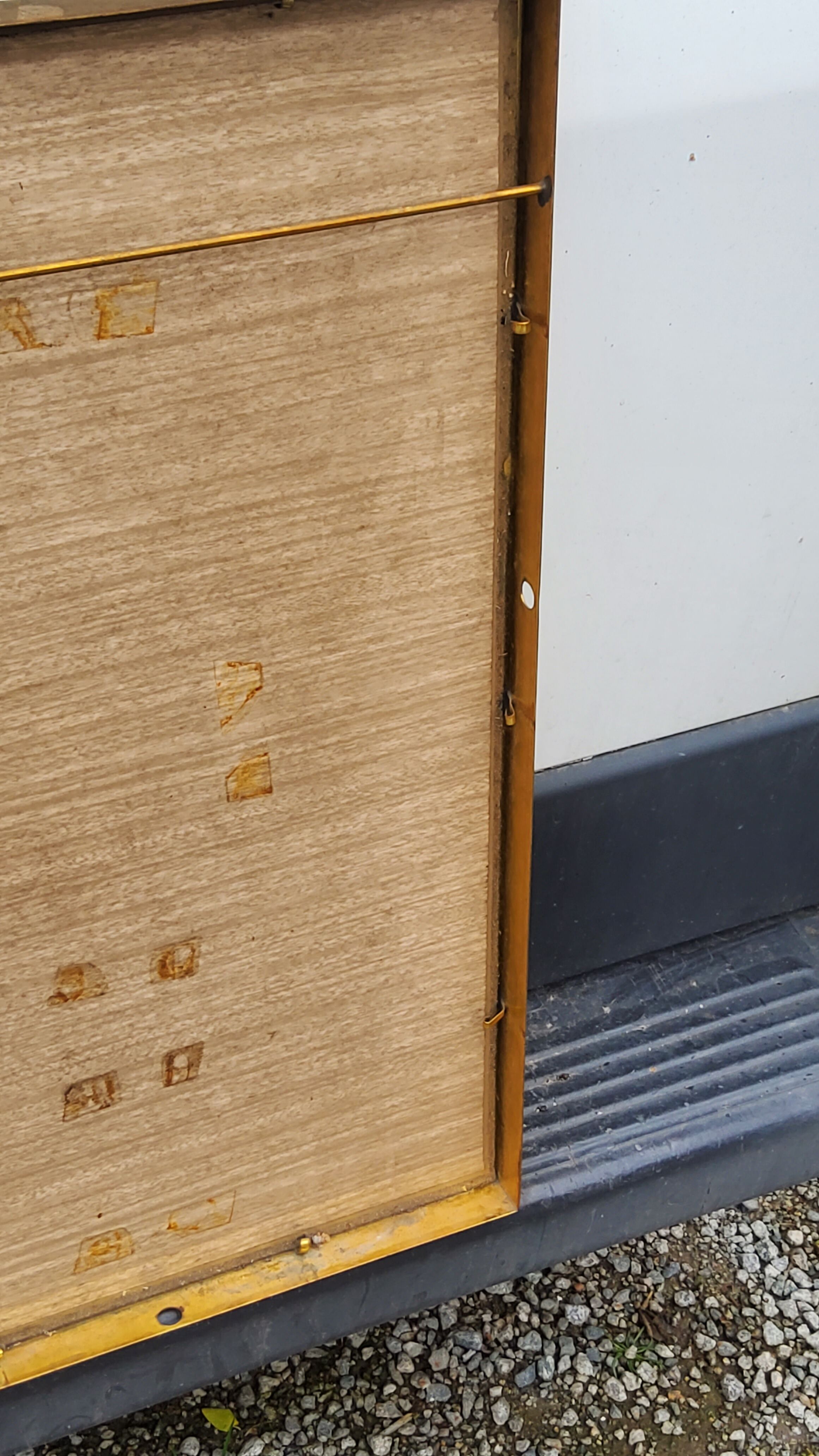 Mirror of the 70s in gilded metal, 60x35 cm