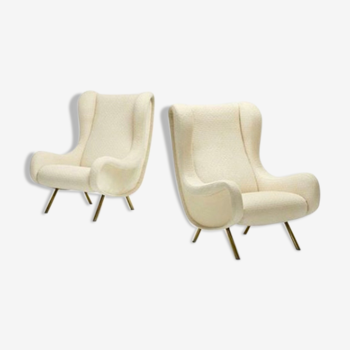 Pair of white buckle chairs