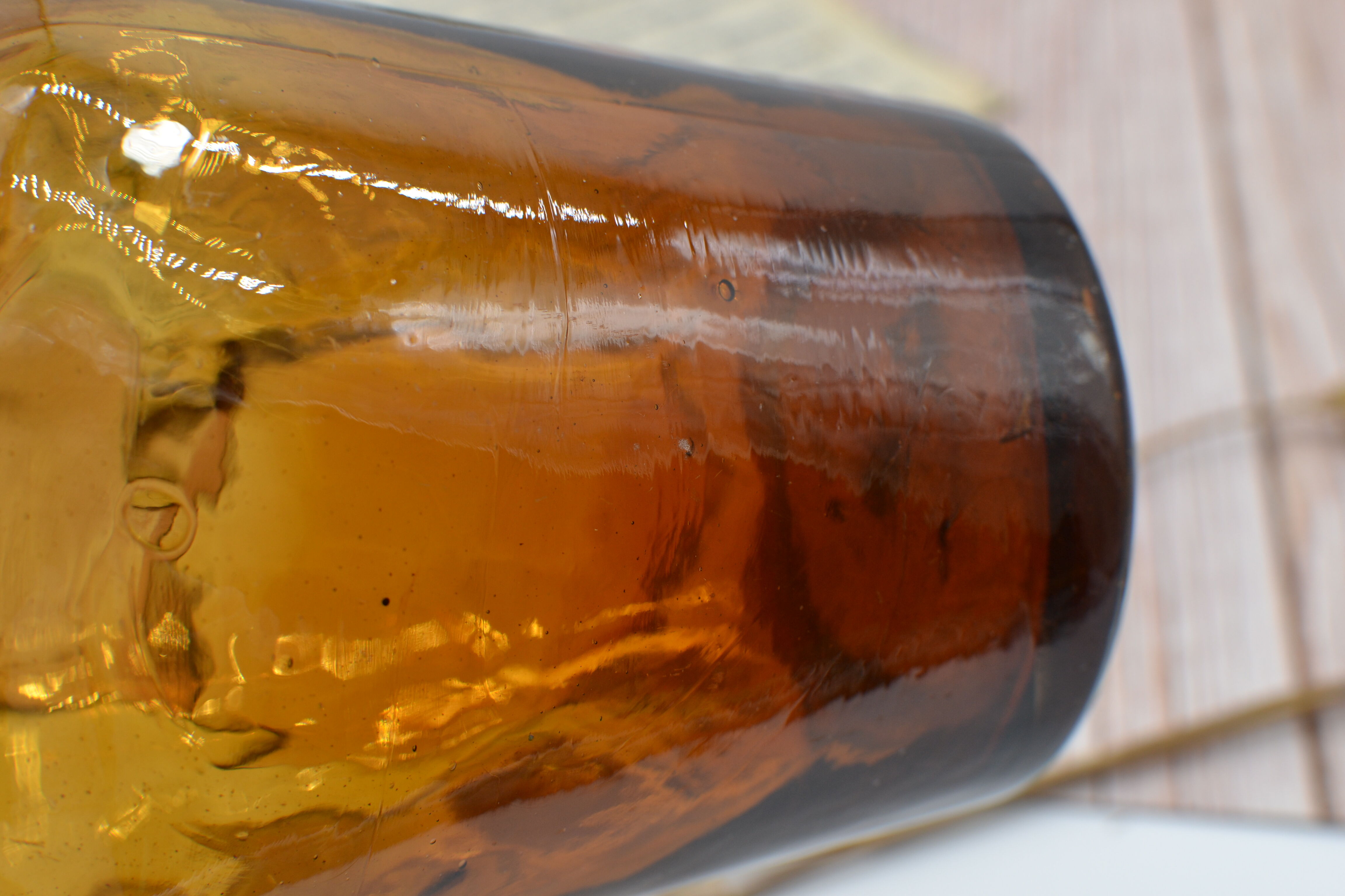 Lady jeanne in amber glass irregular appearance