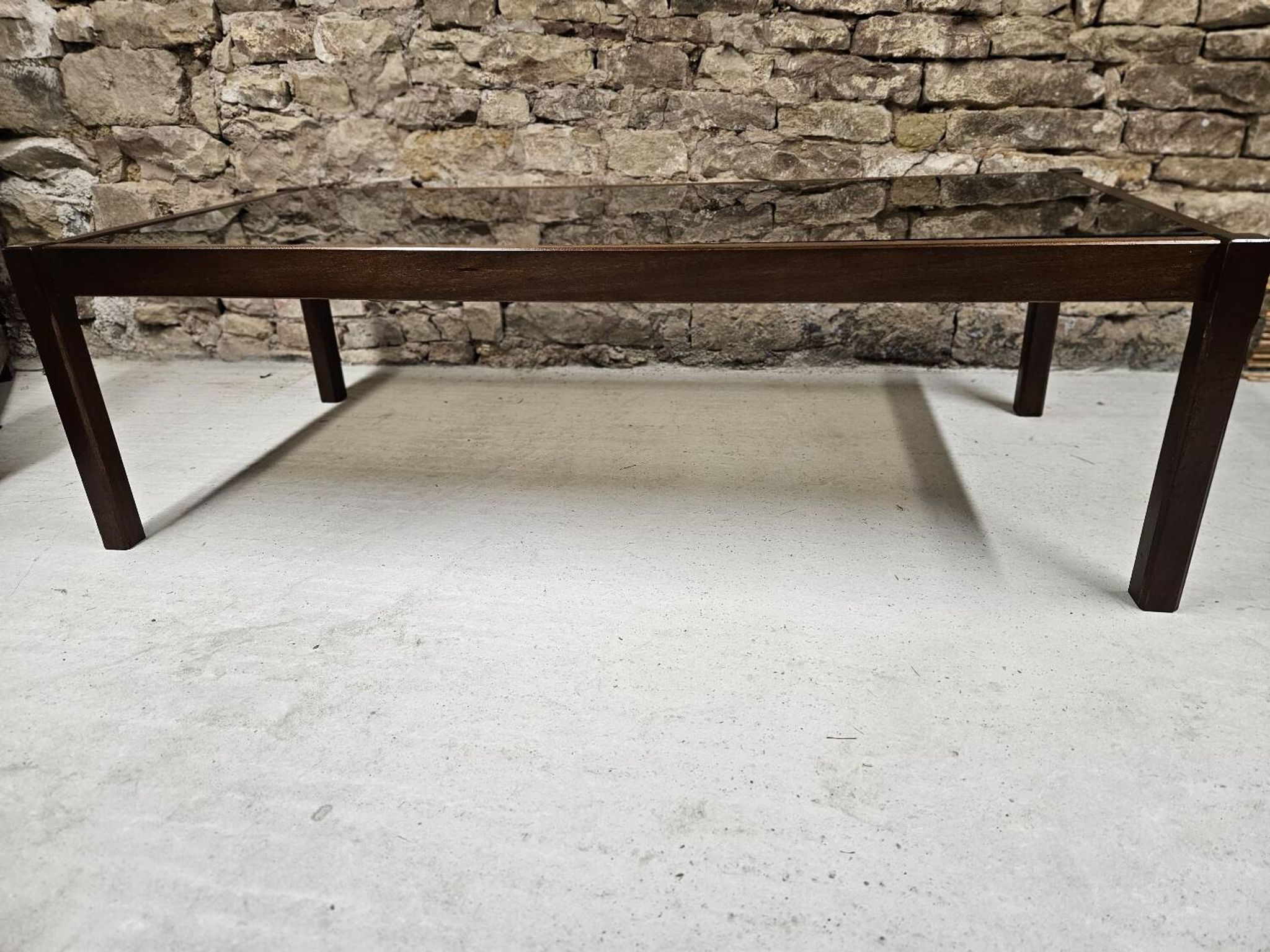 Teak coffee table with smoked glass 1970"