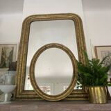 Miroir en bois doré patiné 58cm