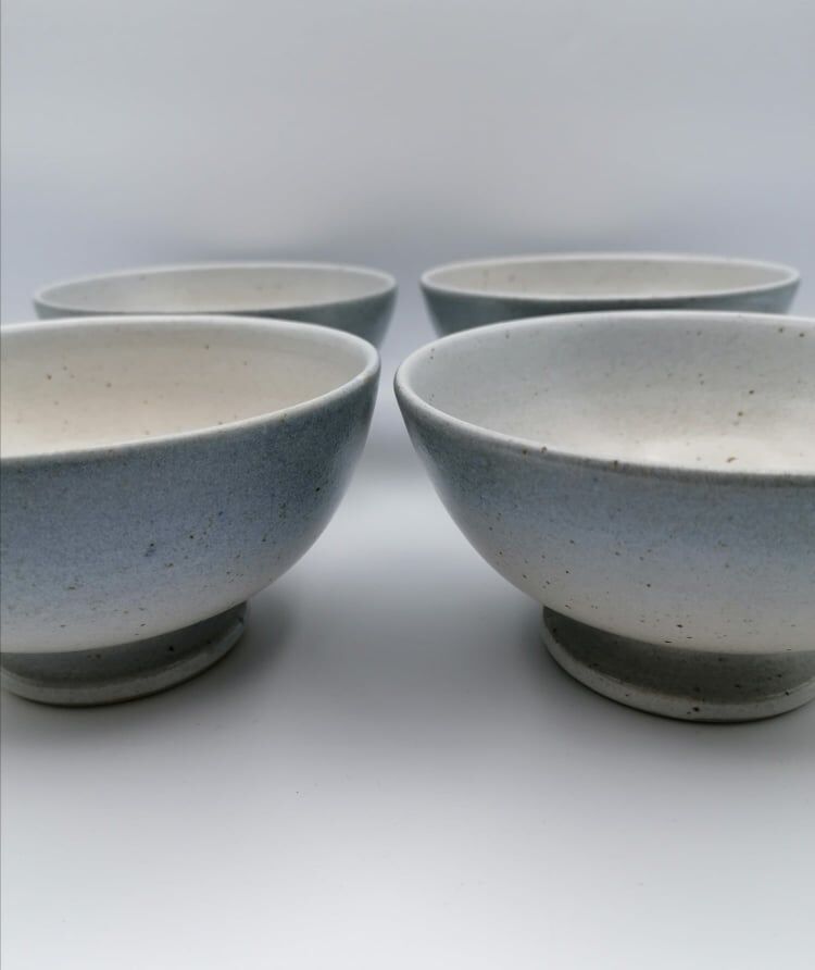 Four bowls in midnight blue sandstone