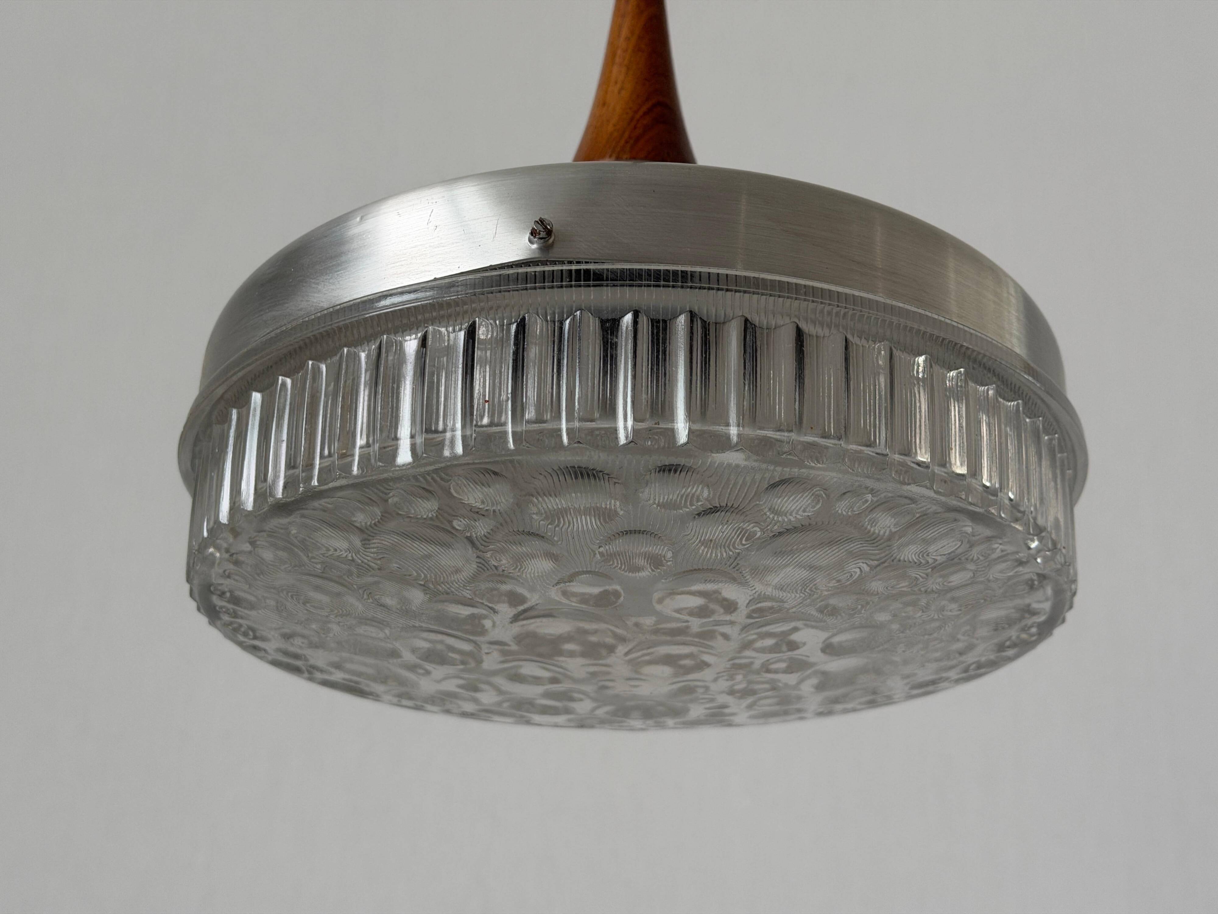 Crystal glass ceiling light with a metal frame and wood details, 1960s, Germany.