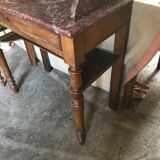Toilet table on red marble