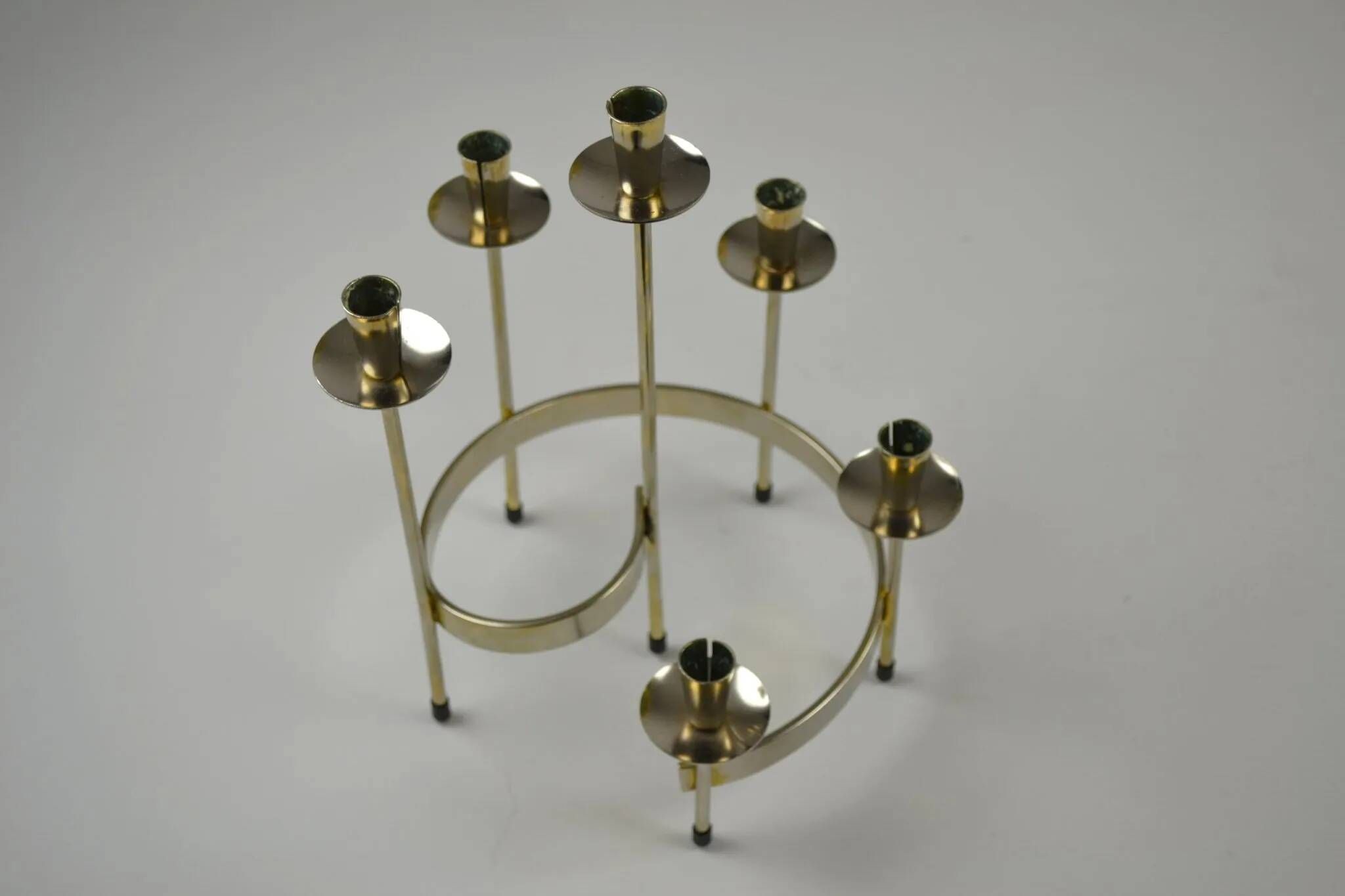 Pair of white metal candle holders "Spiral" by Gunnar Ander for Ystad-Metall, Sweden, 1960s.