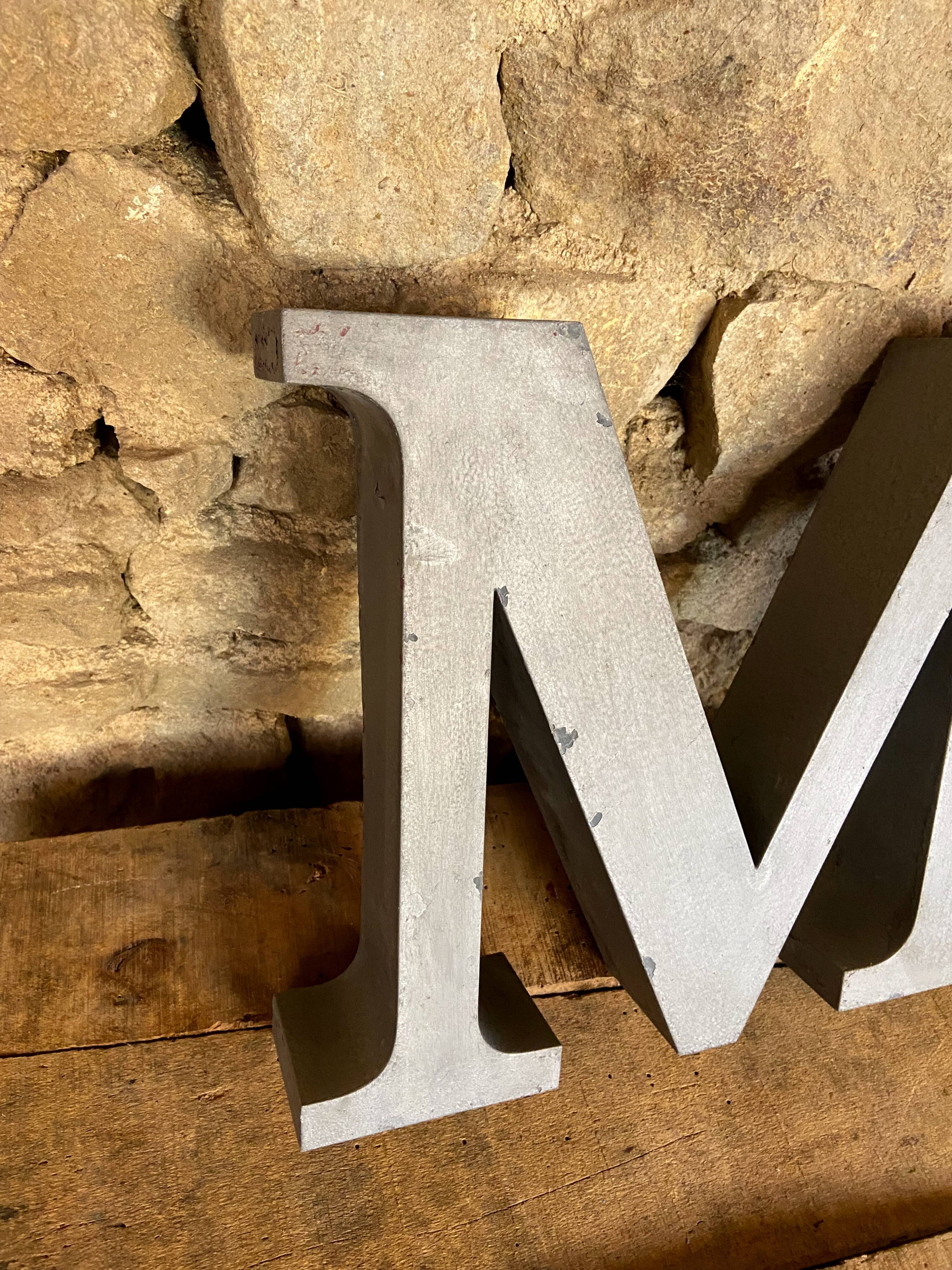 Letter metal - m