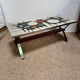 Vintage coffee table from the 60s and 70s in ceramic, chrome metal, and wood.