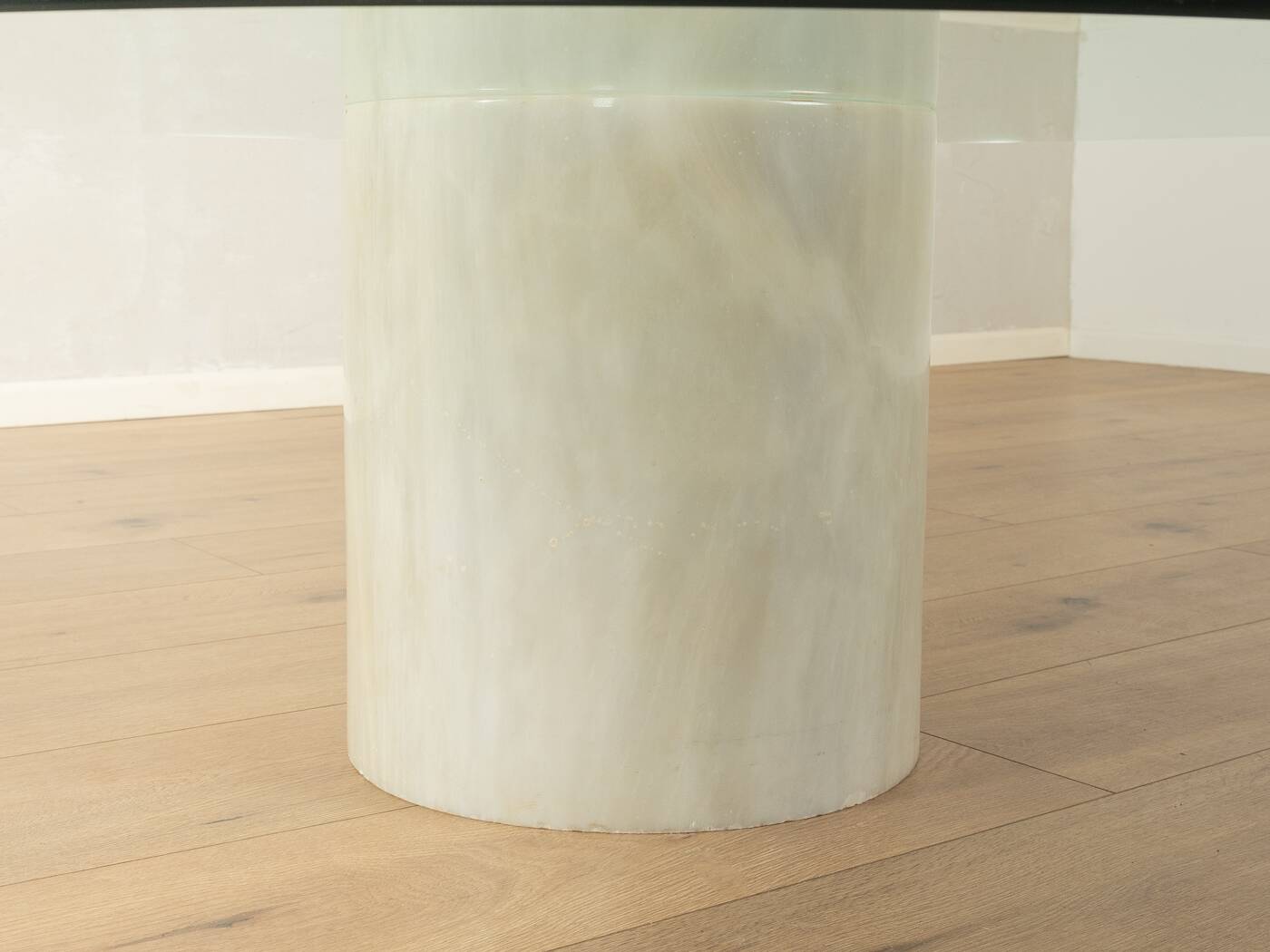 Postmodern coffee table from the 1980s with marble base and glass top