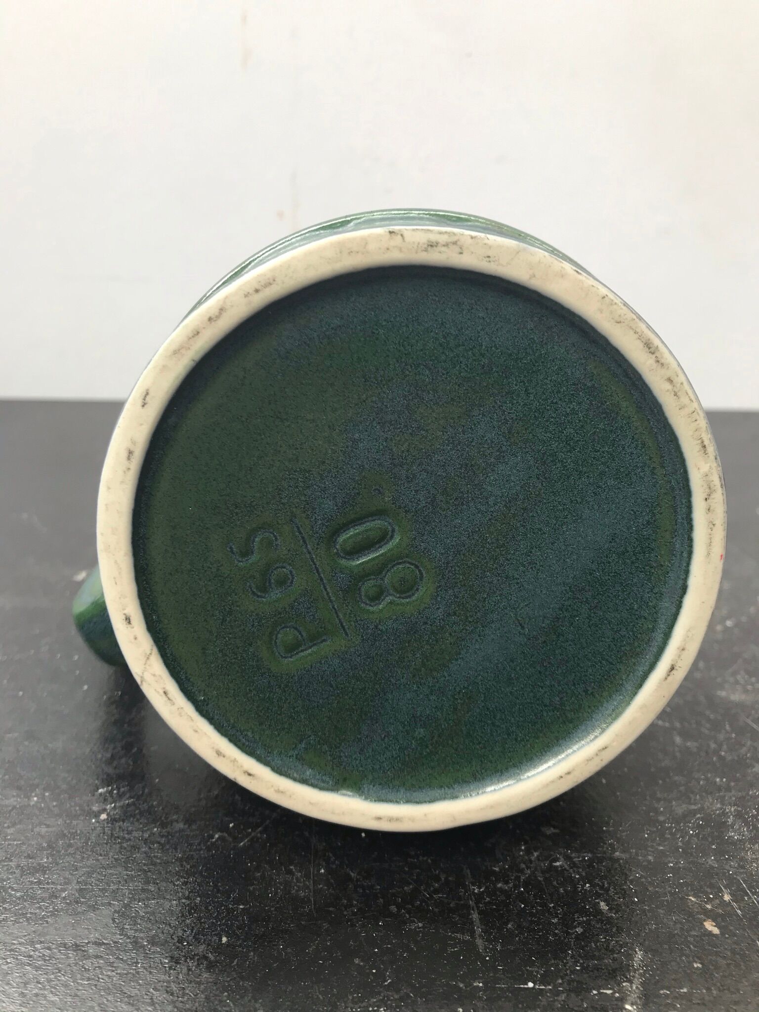 Former green ceramic pitcher shape tonneau