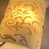 Polished and screen-printed glass sconce by eglo