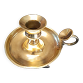 Tailed candle holder.