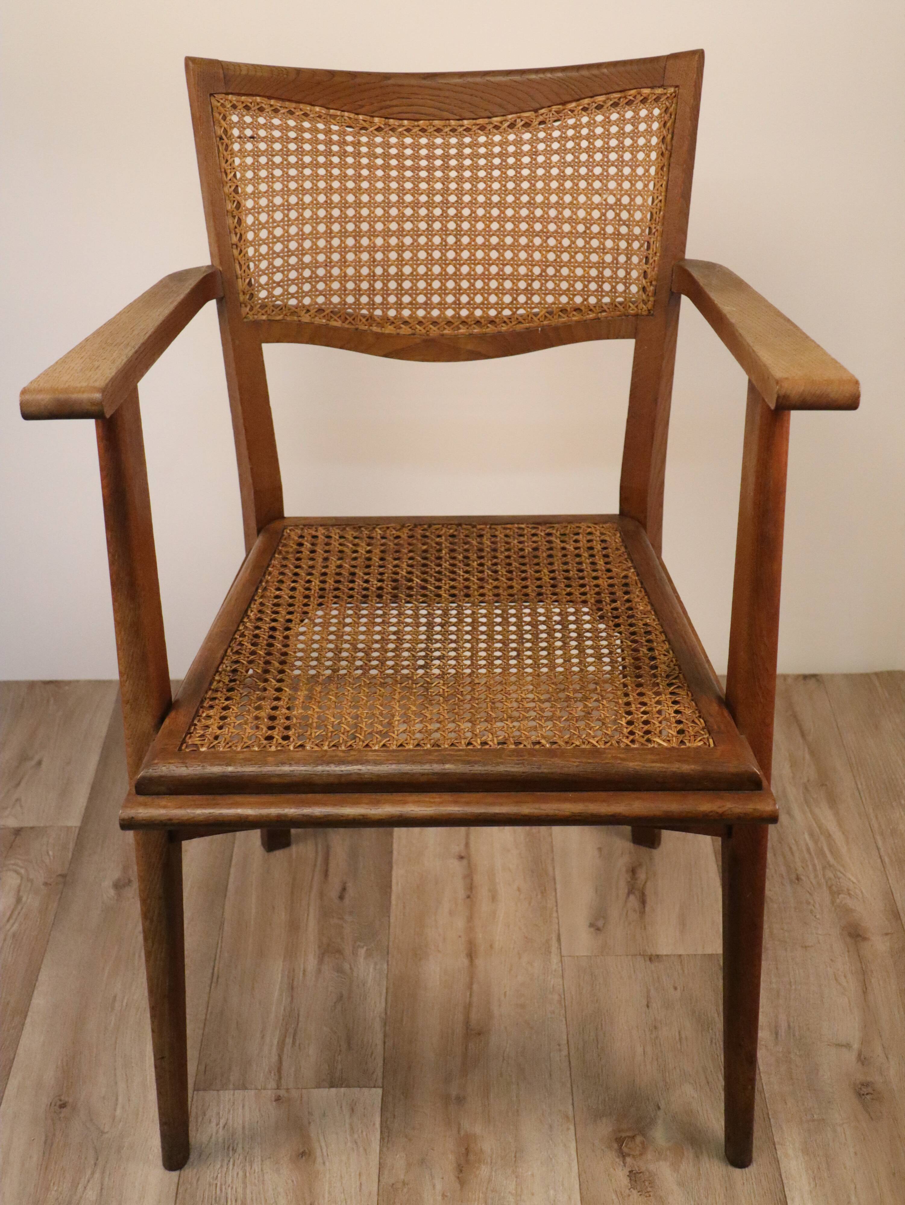 Vintage wooden armchair and canning 1950