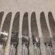 11 silver-plated metal lunch knives by Ravinet Coquille, 18cm