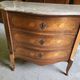 Curved chest of drawers in rosewood and marble marquetry