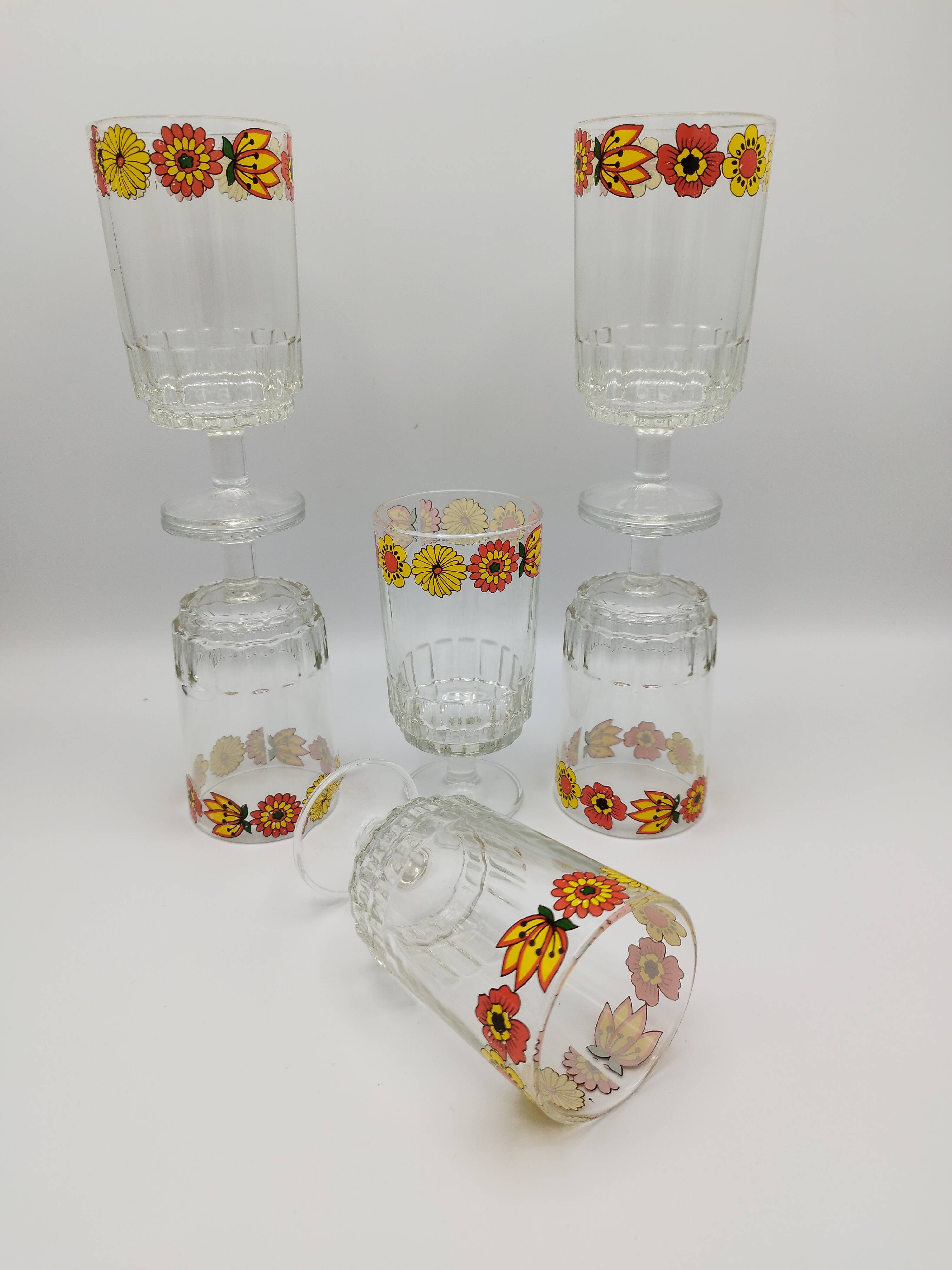 Vintage stemmed glass with floral decoration