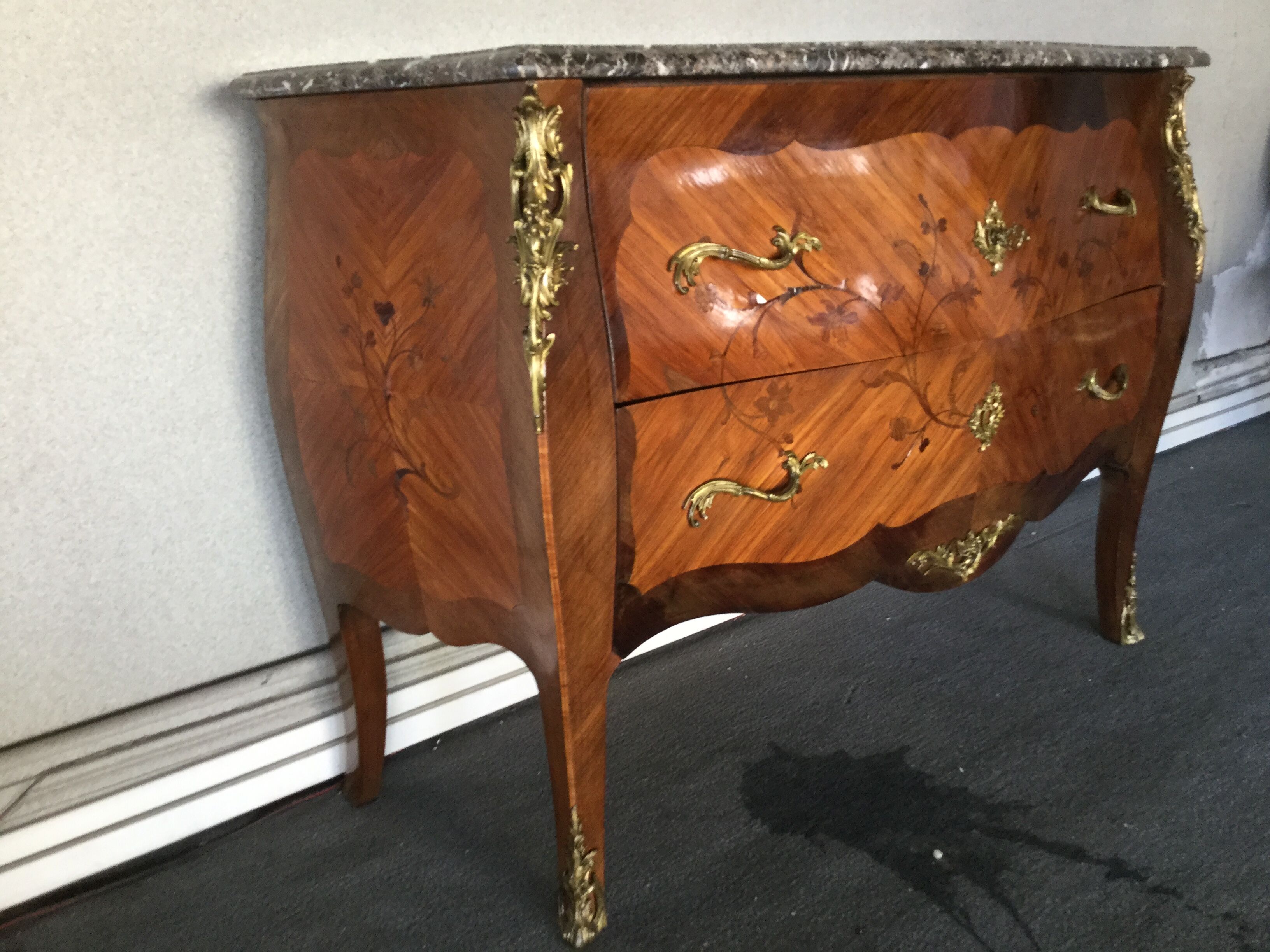 Louis XV-style chest of drawers  in rosewood marquetry