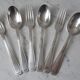 Set of silver metal cutlery 20s