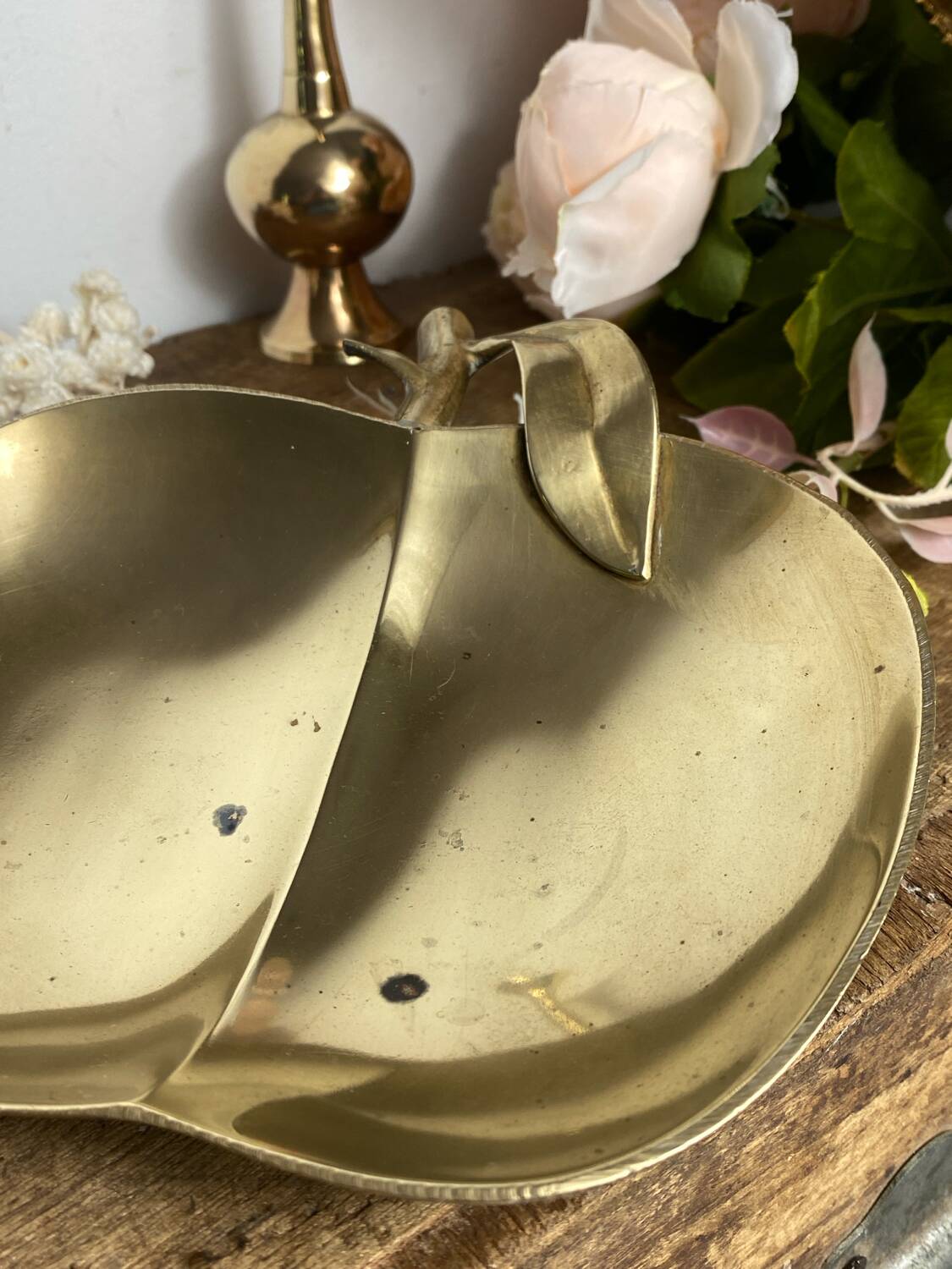 Large brass apple pocket emptier