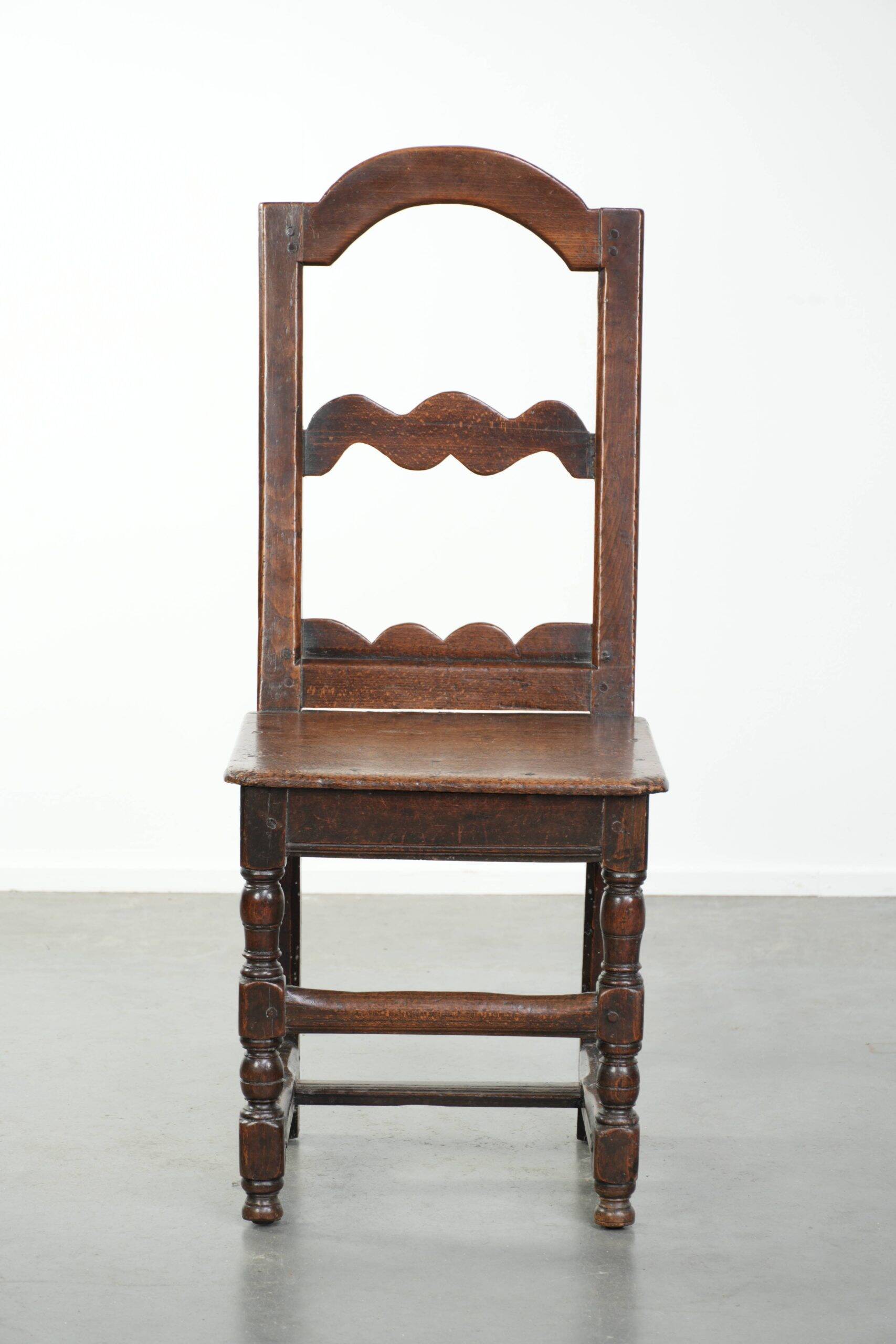 French antique Lorraine chair made of oak from the 18th century