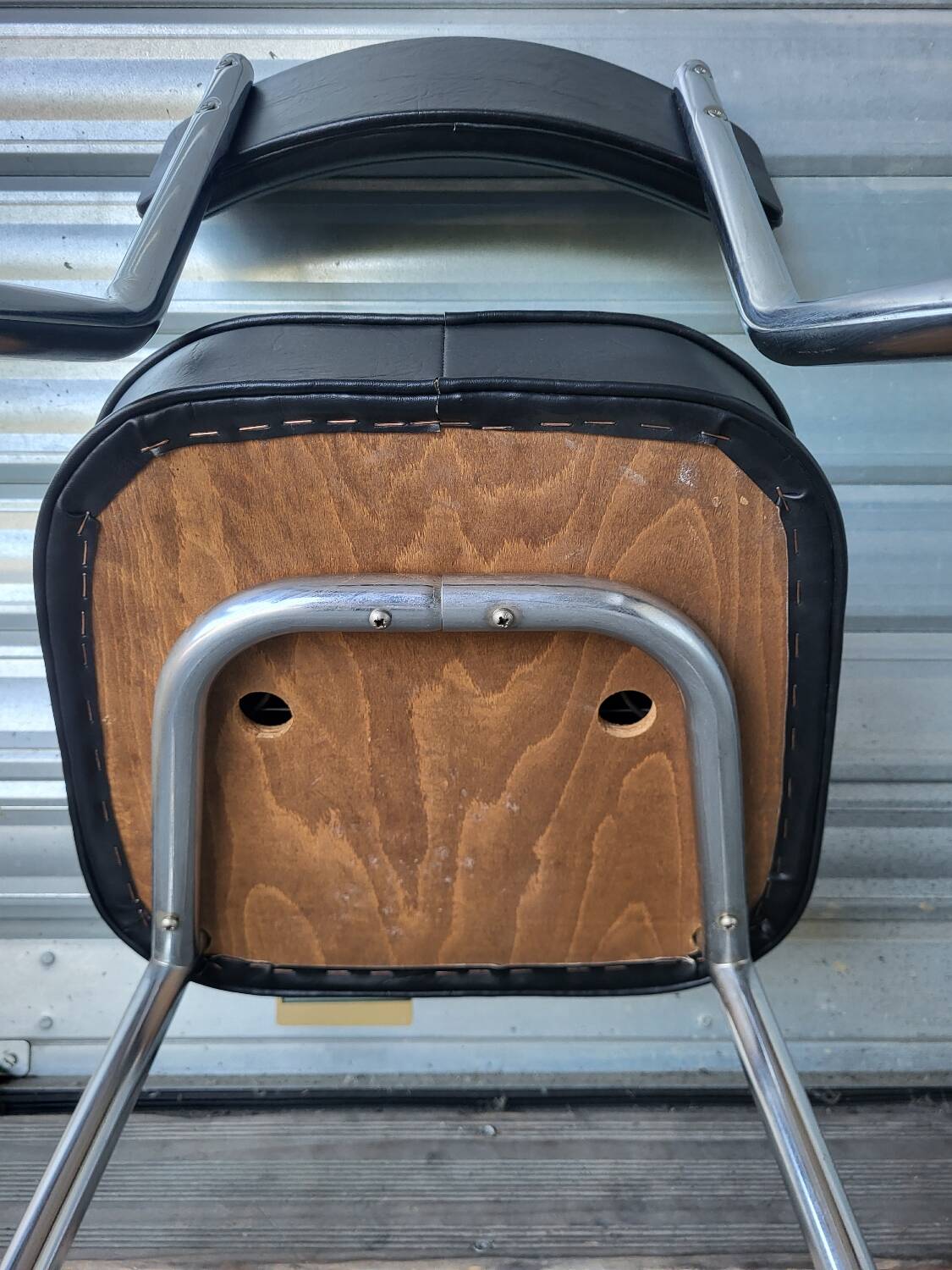 Pair of vintage black and chrome leatherette office chairs in very good condition