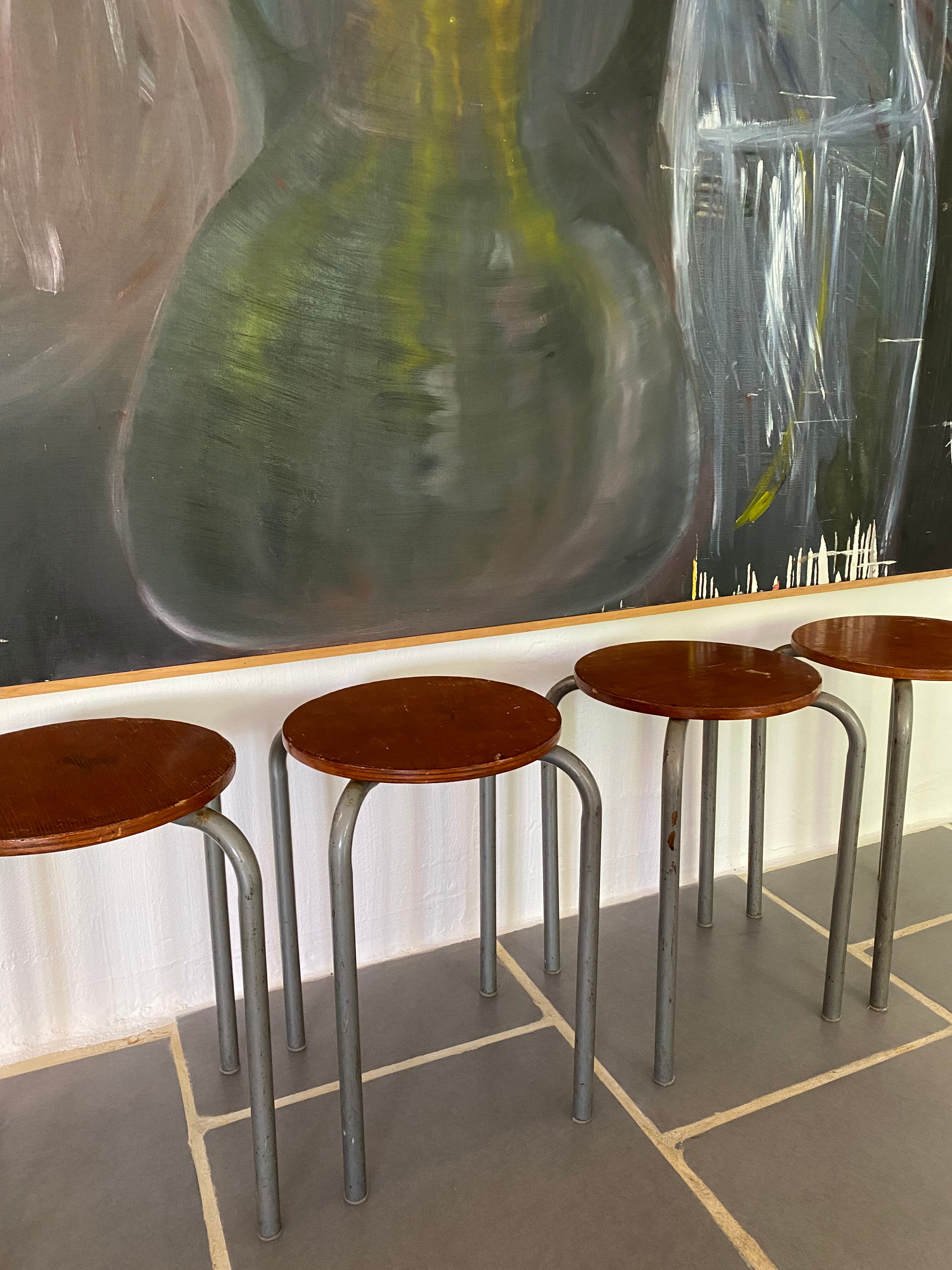 Set of 4 vintage industrial stools 50s