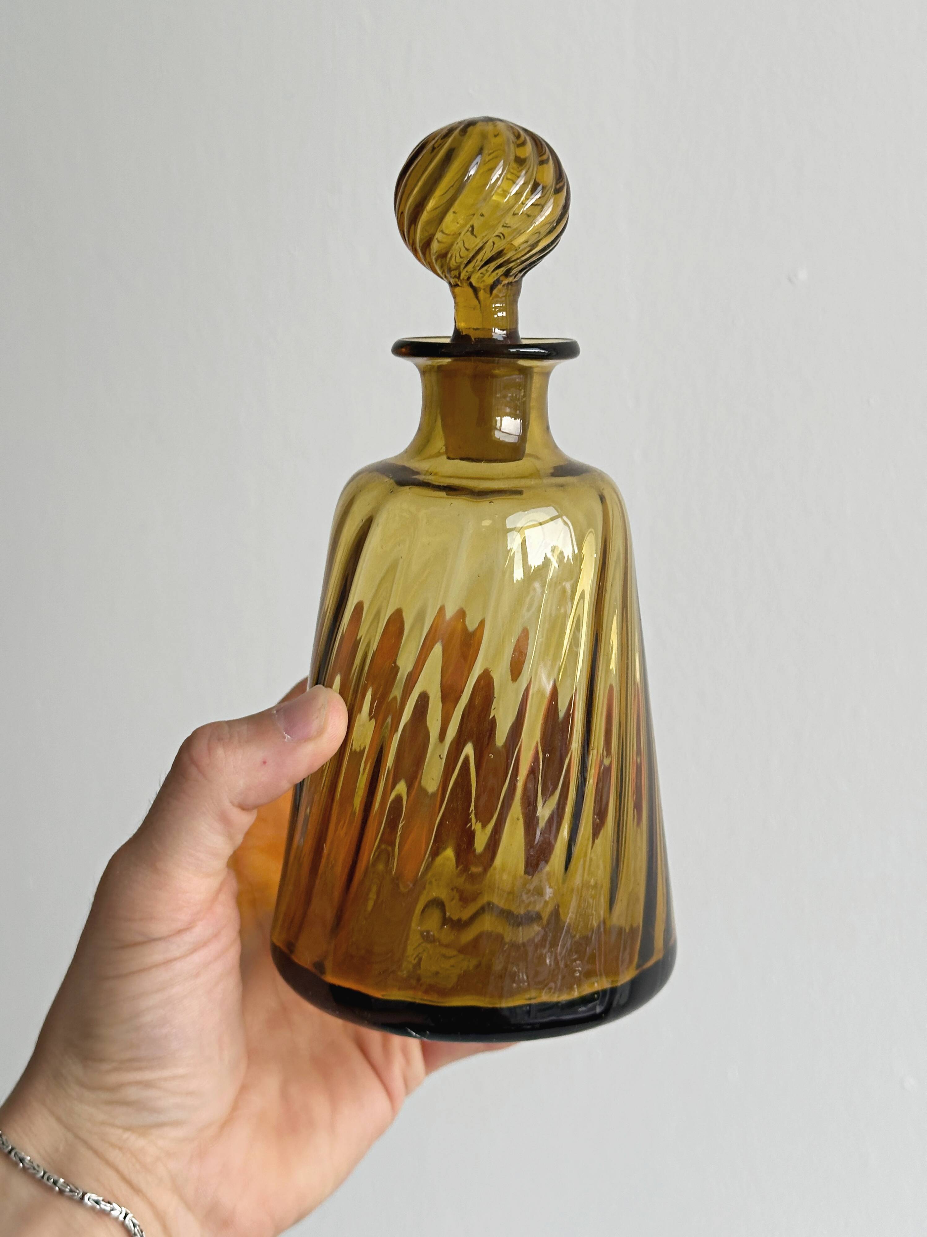 Twisted amber glass carafe