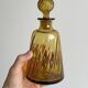 Twisted amber glass carafe