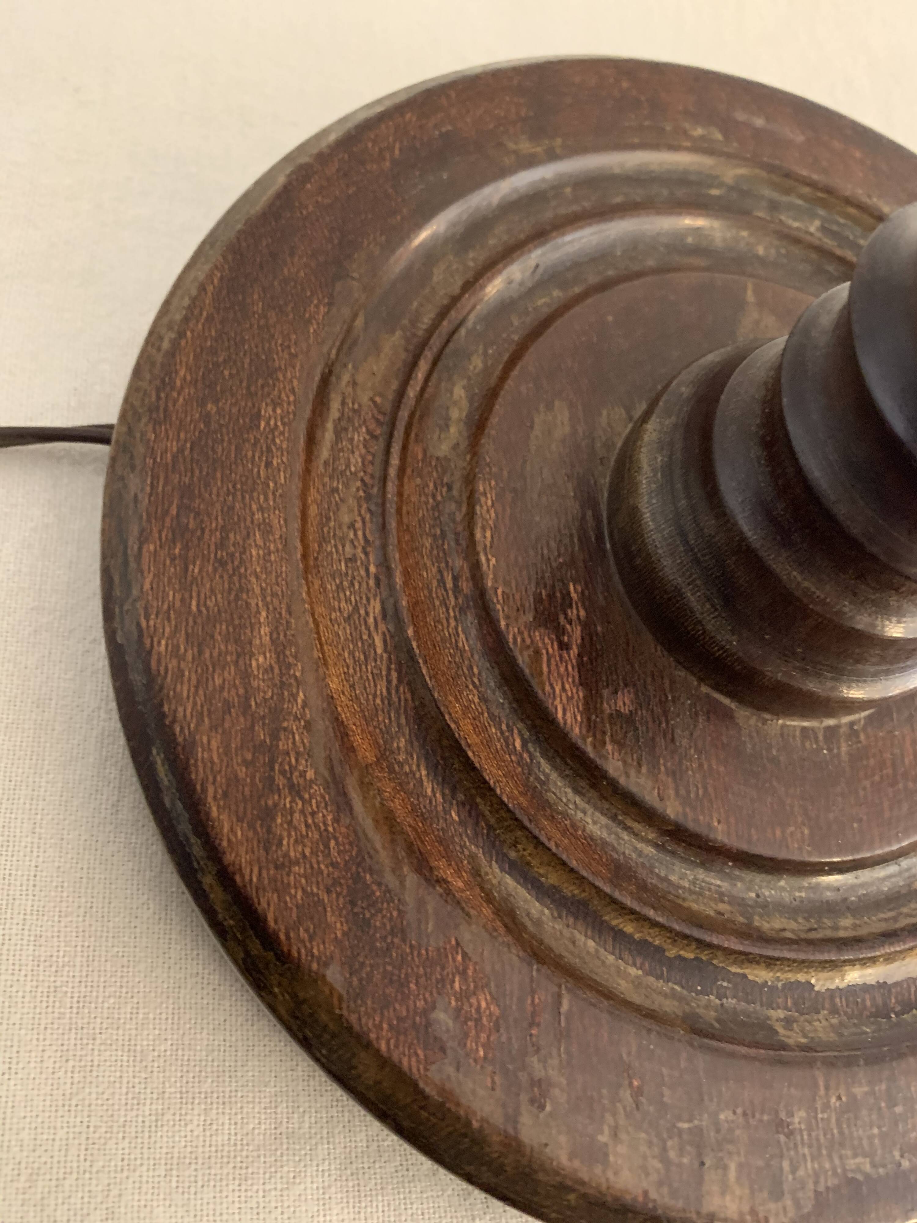 Turned wooden lamp foot in the shape of a warhead