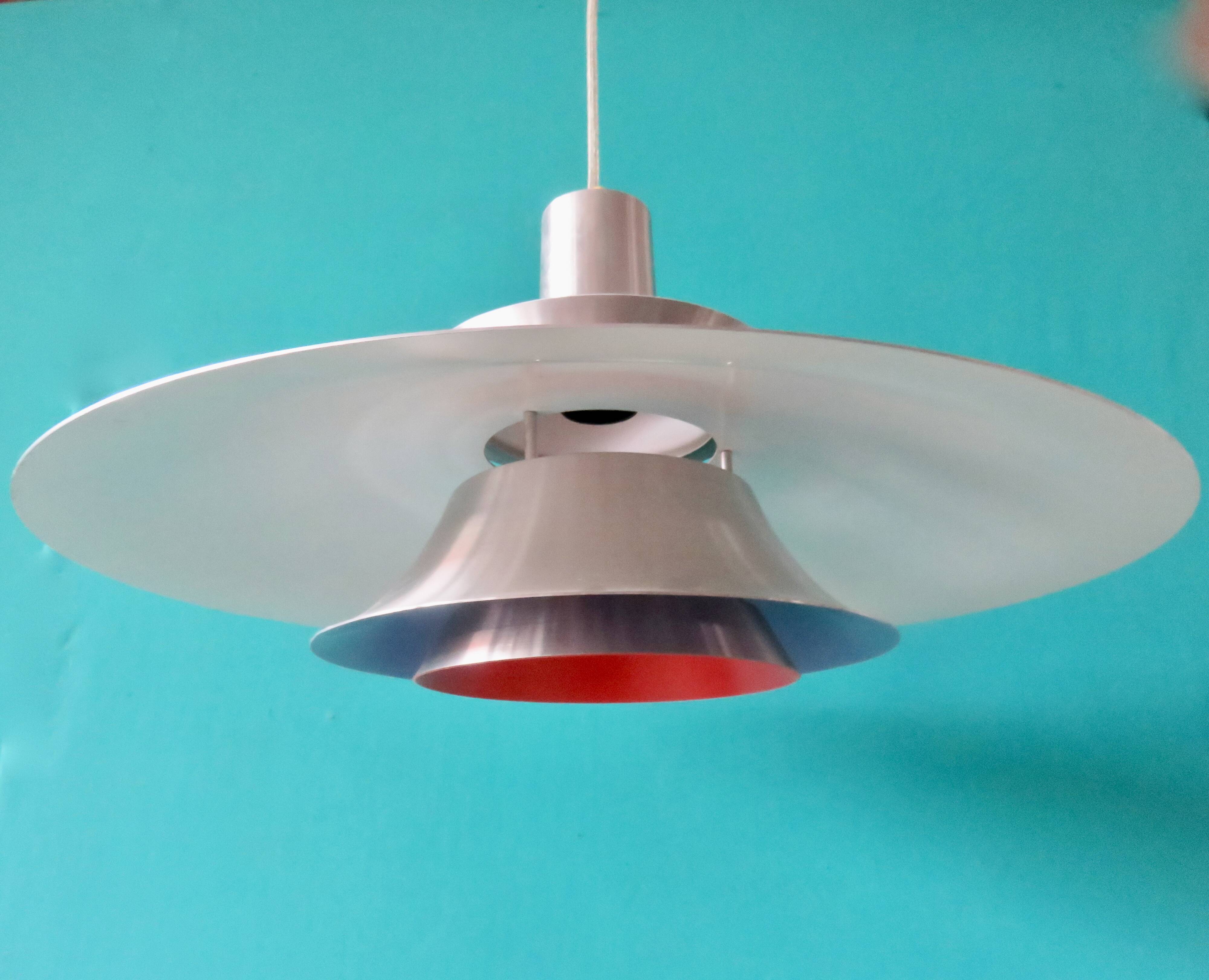 Suspension in brushed aluminum, interior in 3 colors. Denmark 1970