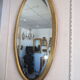 Empire style oval mirror