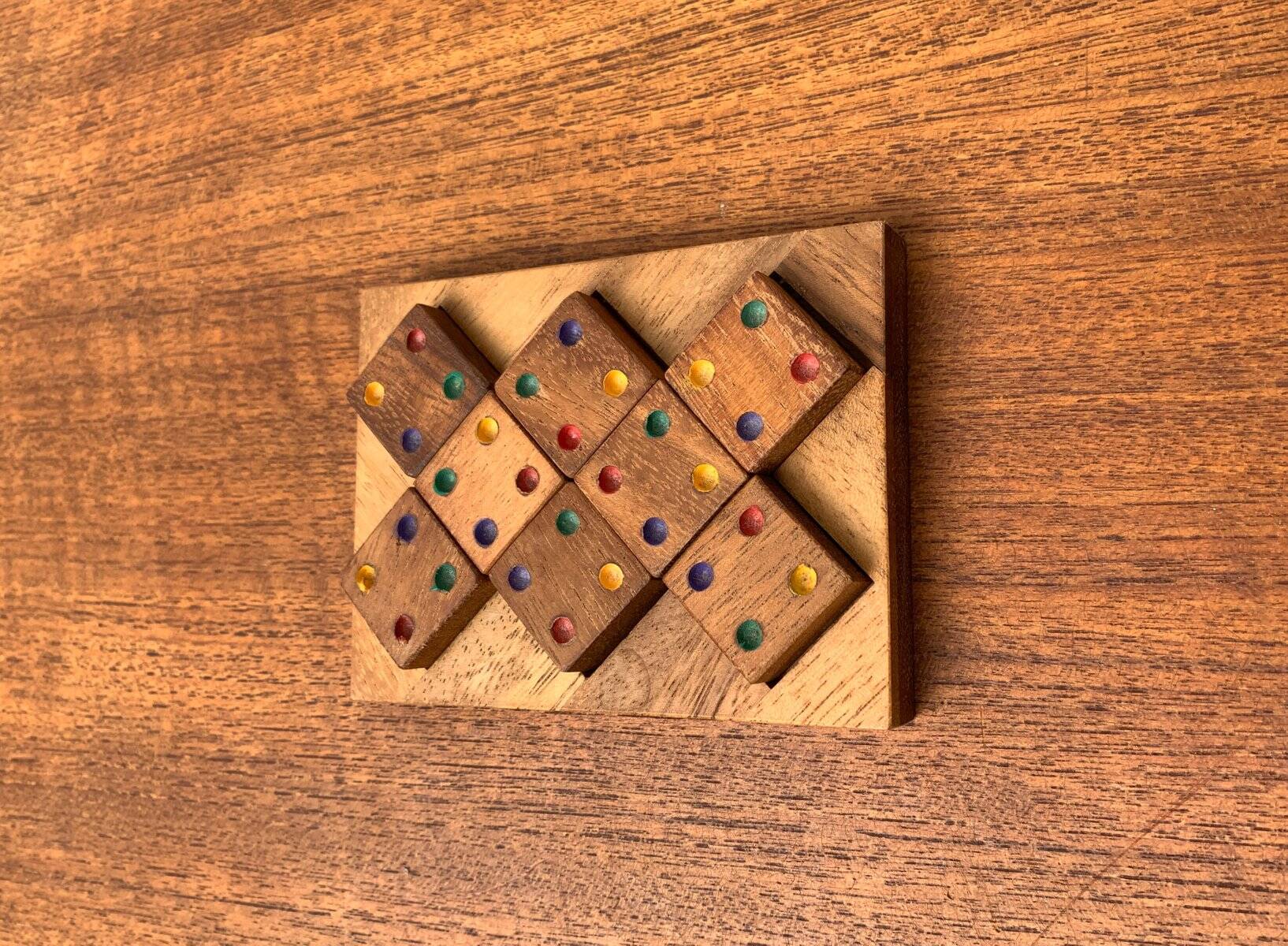 Mid-century Scandinavian teak dice game from the 1960s.