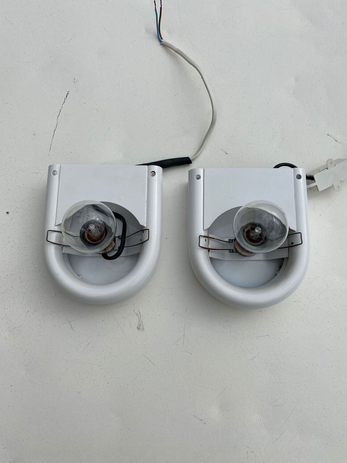 Pair of white and opaline metal wall lights