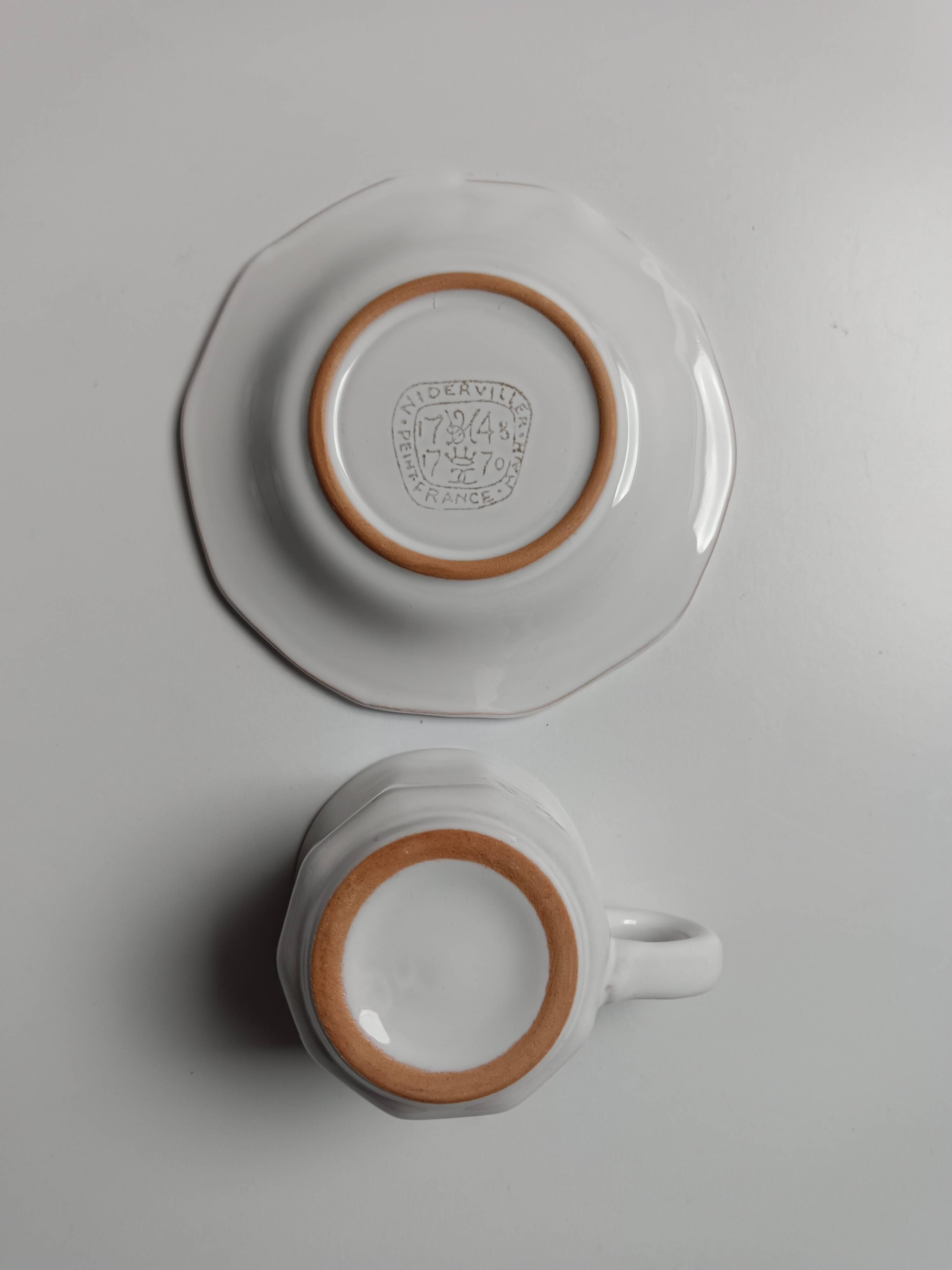 6 tasses Niderviller blanches et roses à décor de fleurs