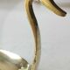 Pair of hand candle holders/Cellar rats shape swans, in polished brass. 1950s